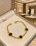 Bvlgari Gold Black Onyx Accent Link Bracelet – Elegant Luxury Jewelry