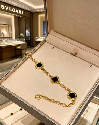 Bvlgari Gold Black Onyx Accent Link Bracelet – Elegant Luxury Jewelry