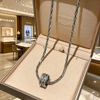 Bvlgari Silver Spiral Ring Pendant Necklace – Elegant Luxury Jewelry