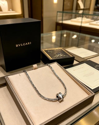 Bvlgari Silver Spiral Circle Pendant Necklace – Elegant Luxury Jewelry