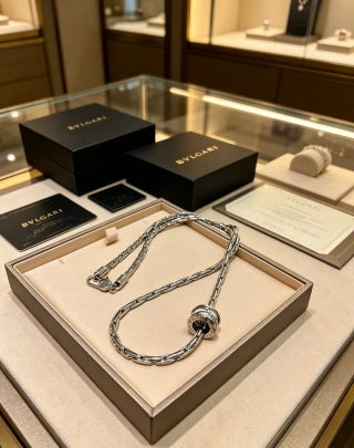 Bvlgari Silver Spiral Circle Pendant Necklace – Elegant Luxury Jewelry