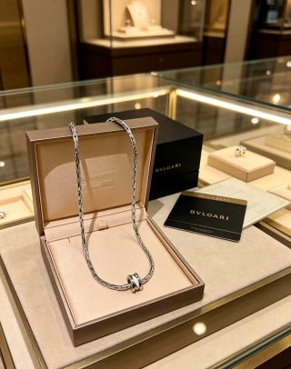 Bvlgari Silver Spiral Circle Pendant Necklace – Elegant Luxury Jewelry