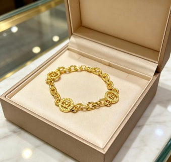 Bvlgari Gold Medallion Link Bracelet – Elegant Luxury Jewelry