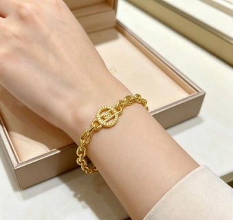 Bvlgari Gold Medallion Link Bracelet – Elegant Luxury Jewelry