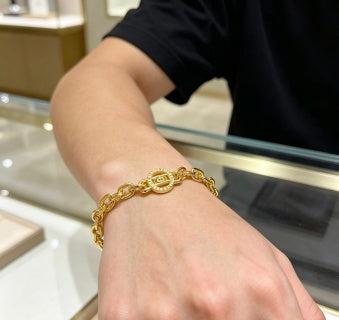 Bvlgari Gold Medallion Link Bracelet – Elegant Luxury Jewelry