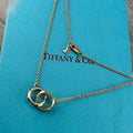 Tiffany & Co. Double-Clasp High-Polish Gold Circle Pendant Necklace with Knife-Edge Detail