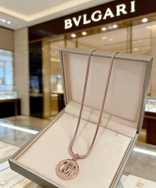 Bvlgari Rose Gold Medallion Pendant Necklace – Elegant Luxury Jewelry