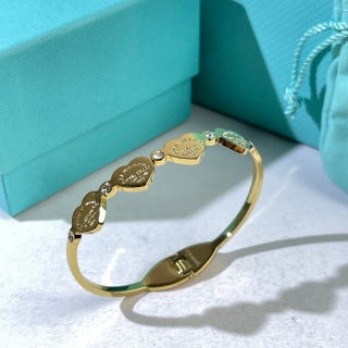 Tiffany Heart Tag Charm Bangle Bracelet – Signature Luxury Jewelry