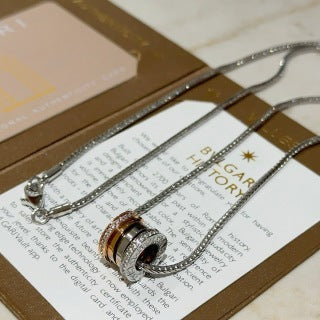 Bvlgari Silver Circle Pendant Necklace – Elegant Luxury Jewelry