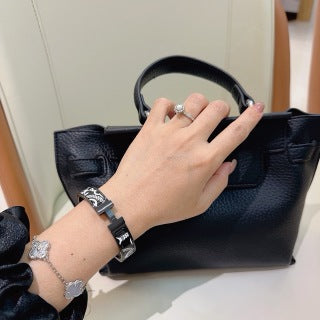 Hermès Black Enamel Signature Hinge Bracelet