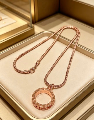 Bvlgari Rose Gold Circle Pendant Necklace – Elegant Luxury Jewelry