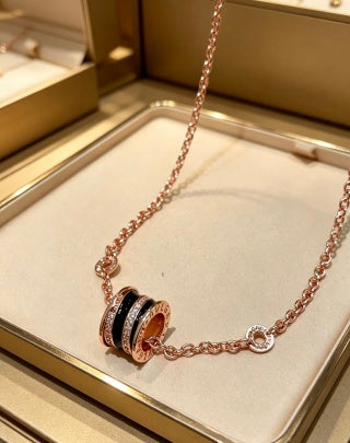 Bvlgari Rose Gold Black Accent Circle Pendant Necklace – Elegant Luxury Jewelry