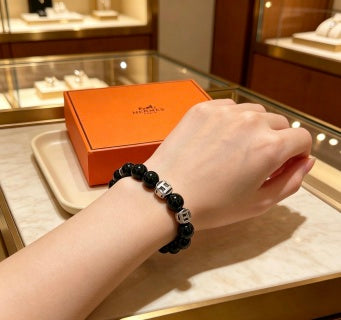 Hermès Obsidian Bead Silver Accent Bracelet