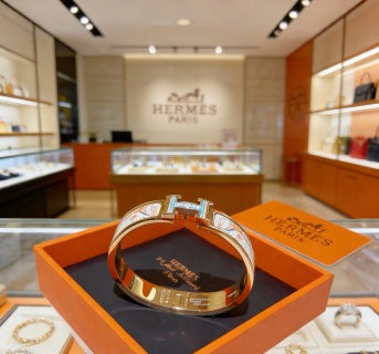 Hermès White Enamel Signature Hinge Bracelet