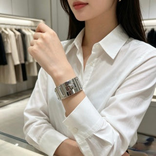 Hermès Silver Signature Lock Cuff Bracelet