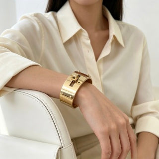 Hermès Luxe Gold Structured Cuff Bracelet 21mm