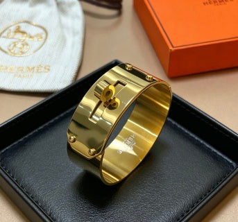 Hermès Golden Wide Hinged Cuff Bracelet 21mm