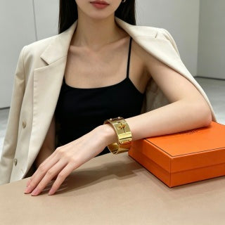 Hermès Golden Wide Hinged Cuff Bracelet 21mm